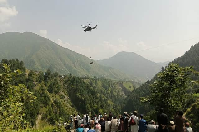 Eight people have been rescued after being trapped inside a cable car in Pakistan