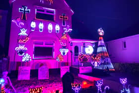 The house in Bristol is covered with around 8,000 lights to raise money for charity at Halloween