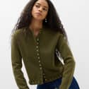 M&S Ruffle Crew Neck Cardigan. Pictured is the dark khaki colour.