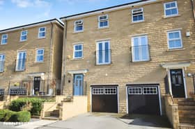 The Jilling Gardens property has a driveway leading to a garage with power and lighting, alongside a pebbled seating area