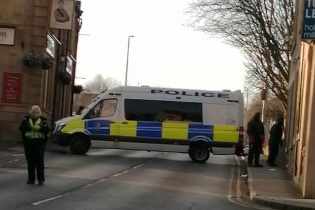 Onlookers watched as officers from West Yorkshire Police sealed off Wellington Road and Commercial Street, before entering the former Yorkshire Bank premises on Sunday afternoon.