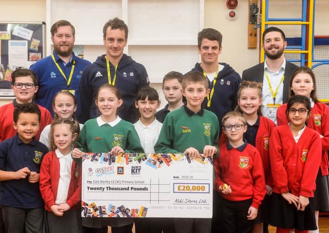 Aldi Cheque: Alistair and Jonny Brownlee at East Brierley School.