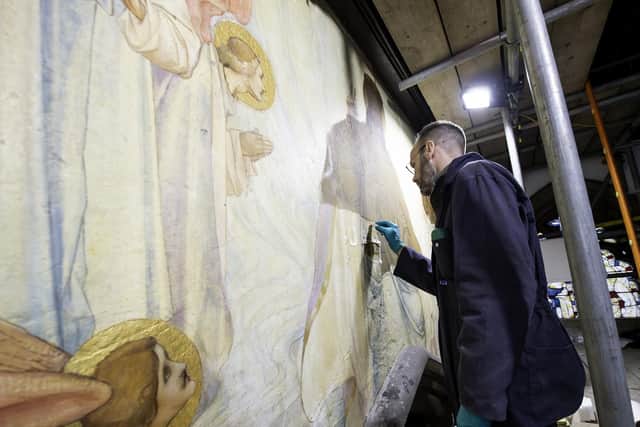 Stephen Rickerby restoring the Frampton murals in St Peter's church