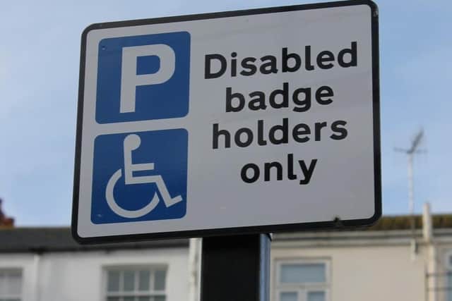 Blue badge parking sign