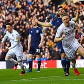 Luke Ayling turns to celebrate his goal for Leeds United against Huddersfield Town. Picture: Jonathan Gawthorpe