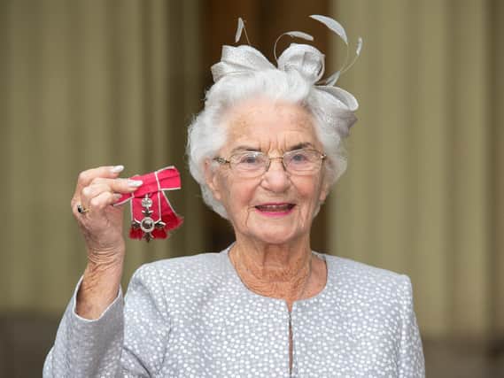 Eileen Fenton with her MBE medal, following an investiture ceremony at Buckingham Palace, London. Picture: Dominic Lipinski