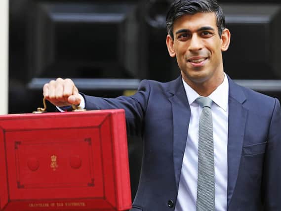 Chancellor Rishi Sunak outside 11 Downing Street, London, before heading to the House of Commons to deliver his Budget. PA Photo.