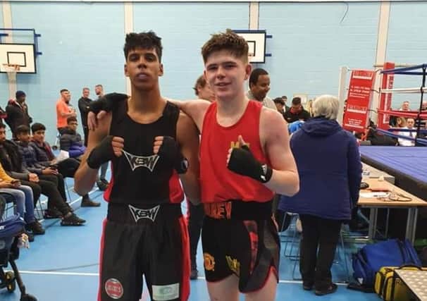 KBW boxer Zaid Maniar with Mickey Jennings Jnr following his victory in the English Championships quarter-finals,