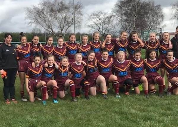 Dewsbury Moor Girls Under-14s show off their new kit sponsored by IMAP Electrical Services and Des Hartley and Son’s.