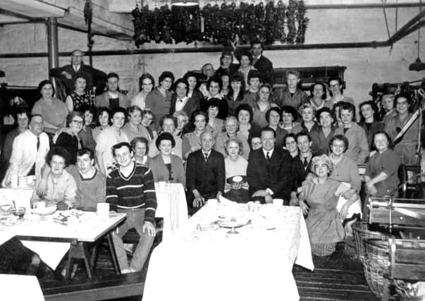 Group photo: This photograph was taken at one of the many parties held in the weaving shed at Crabtrees Mill, Dewsbury Moor, when Dorothy Wilson worked there. It is thought the picture might have been taken to celebrate the 80th birthday of the mill’s owner, Mr Stanhope Crabtree, or the Coronation in 1951.