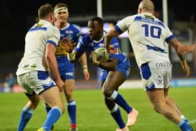 Muizz Mustapha, pictured on his first team debut magianst Workington last year, was among the try scorers for Rhinos reserves when they began their season with a win over Bradford Bulls.