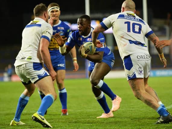 Muizz Mustapha, pictured on his first team debut magianst Workington last year, was among the try scorers for Rhinos reserves when they began their season with a win over Bradford Bulls.