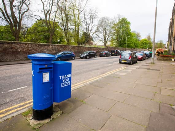 One of the new blue postboxes to thank the NHS. Picture: SWNS.
