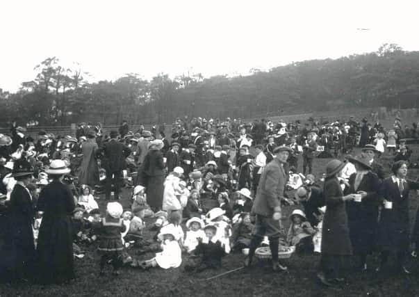 Whitsun Walk: This picture shows members of Ebenezer Congregational Church in Dewsbury, now known as the Longcauseway Church, following their Whitsuntide Walk in 1913. They are seen enjoying their Whitsuntide festivities on fields at Burking Banks. No doubt they would have been able to enjoy their Whitsuntide currant buns.