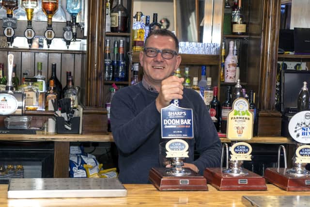 Alan Ingle prepares to open his pub, The Pear Tree in Mirfield on July 4th. Picture Scott Merrylees