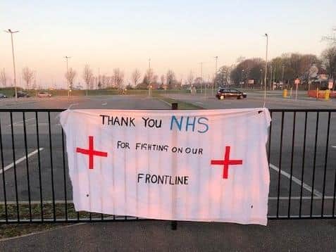 A banner was left draped over the front of Pinderfields' staff car park at the height of the pandemic.