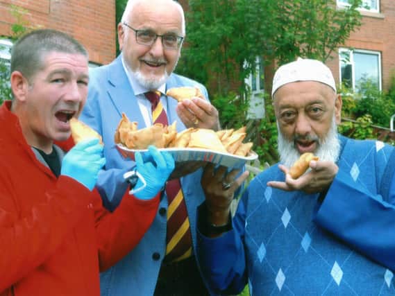 Mosque leader and retired chef Siraj Valli with Jay Micklethwaite of Happy Hour Yorkshire and Peter Charlesworth,President Of Dewsbury Moor Rugby League Club.