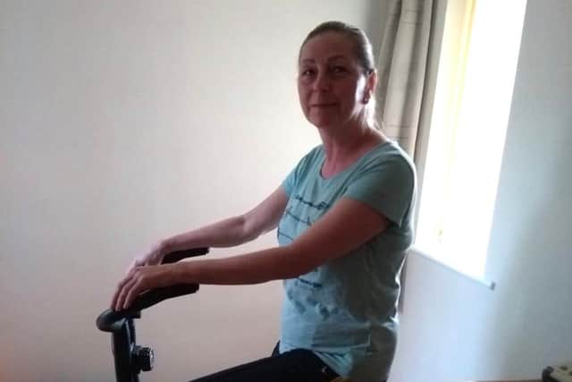 Jules Armitage on her spin bike