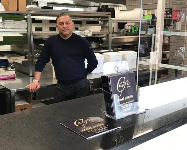 Paymen Karimi behind the counter at the home dining takeaway at Capri in Mirfield.