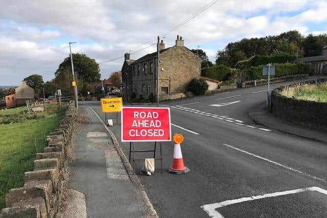 A main road in Mirfield was shut after a water pipe burst.
