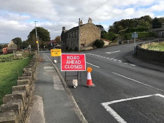 A main road in Mirfield was shut after a water pipe burst.