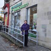 Councillor Gwen Lowe outside the Yorkshire Building Society in Batley (Picture Mike Clark)