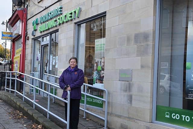 Councillor Gwen Lowe outside the Yorkshire Building Society in Batley (Picture Mike Clark)
