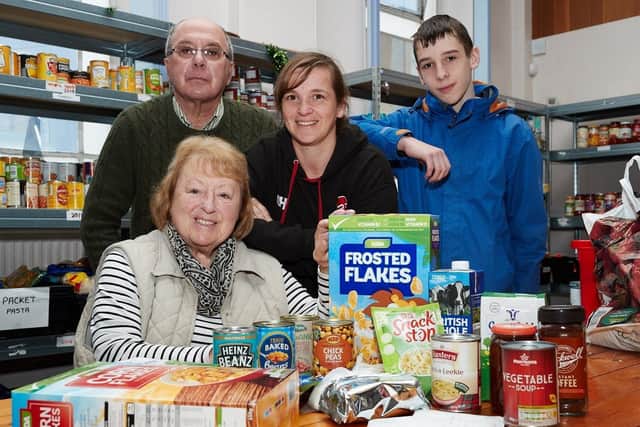 Batley Food Bank is preparing for a busy Christmas periodPictured are Audrey Ashton, Philip Hoyle, Charlotte Hardy and Tom Hardy