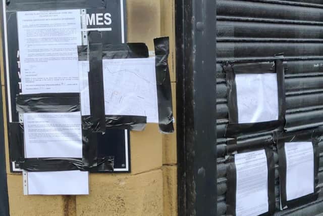 Closure notices on the hairdressers in Oakenshaw