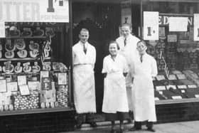 Ready to serve: This picture reminds us of when there were plenty of grocery stores in the town centre, Redman’s being just one of them. This picture shows staff outside the store in Daisy Hill in 1935, including Nellie Walshaw, then aged 21. Kindly loaned by her daughter, Carol Hall, some years ago.