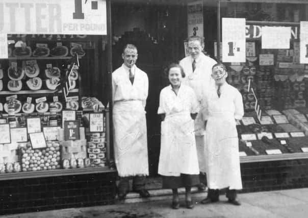 Ready to serve: This picture reminds us of when there were plenty of grocery stores in the town centre, Redman’s being just one of them. This picture shows staff outside the store in Daisy Hill in 1935, including Nellie Walshaw, then aged 21. Kindly loaned by her daughter, Carol Hall, some years ago.