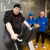 Tim Wood who is doing a sponsored cycle and weight lifting, with mentor Jeannie Ellam and gym owner Roy Ellam, at Roy Ellam Fitness Centre, Mirfield.