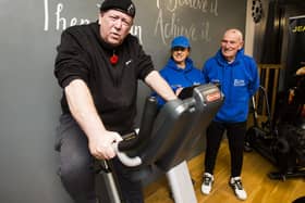 Tim Wood who is doing a sponsored cycle and weight lifting, with mentor Jeannie Ellam and gym owner Roy Ellam, at Roy Ellam Fitness Centre, Mirfield.