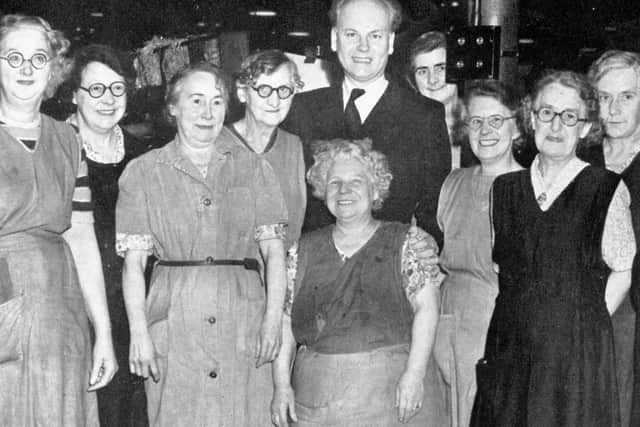 Blanket coverage: Famous author and broadcaster of the 1950s, Godfrey Winn is pictured with a group of weavers from Wormalds and Walker’s mill, Thornhill Lees – the biggest blanket manufacturing mill in the country. He went there in search of material for his book, The Queen’s Countrywomen, which was all about working women.