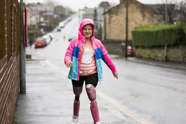 Maisie Catt, 11, doing a 26-mile fundraising walk inspired by  Captain Sir Tom Moore.