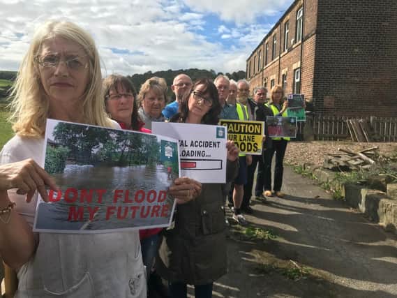 Members of Granny Lane Area Action Group (GLAAG) by meadowland in Hopton Bottom, near Mirfield, which has been turned down for housing