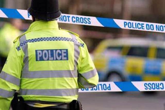 A gang of men attacked two people in a Dewsbury house