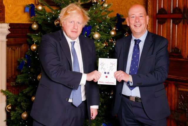 COMPETITION: Mark Eastwood MP presenting the winning Christmas card to the Prime Minister