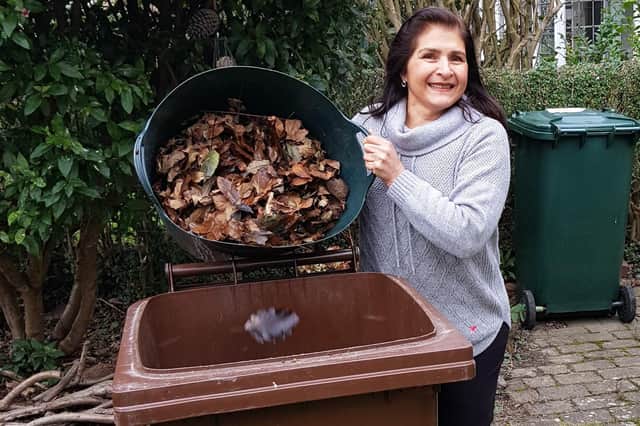 Councillor Naheed Mather busy tidying up a garden ready for the brown bin to be emptied again in February