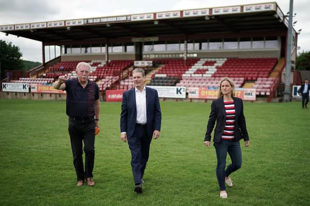 Batley Bulldogs chairman Kevin Nicholas at the historic Mount Pleasant ground with Labour leader Sir Keir Starmer and MP for the area Kim Leadbeater. Picture: Getty Images