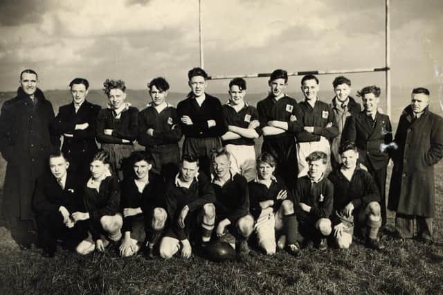 YMCA ROVERS: Under-18 rugby team at Mount Pleasant in 1949 after beating Batley Boys, Mr Carter, top left, was the coach