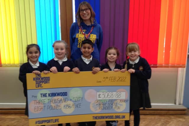 Crossley Fields School in Mirfield has raised nearly £4,000 for Kirkwood Hospice in memory of teacher Laura Cook, who died last year
