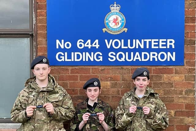 Cadets Thomas Powles, Emily Richards and Katie Ashford with their newly awarded Blue Wings