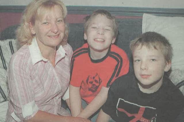 Linda with her sons Rusell and Tom