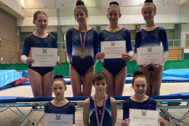 Town Flyers Trampoline Club's squad took part in an international virtual trampoline competition. Pictured left to right are: Back row - Chloe Beaumont, Maggie Baird, Holly Walker, Sophie Mallinson. Front Row - Francesca Shutt, Daniel Pellegrina, Esme Keal.
