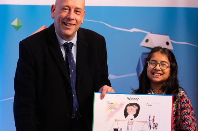 Dewsbury MP Mark Eastwood with Maleehah Ismail, 10, from Headfield Junior School in Dewsbury who was crowned one of the winners of a national art competition run by Parent Zone in partnership with Google