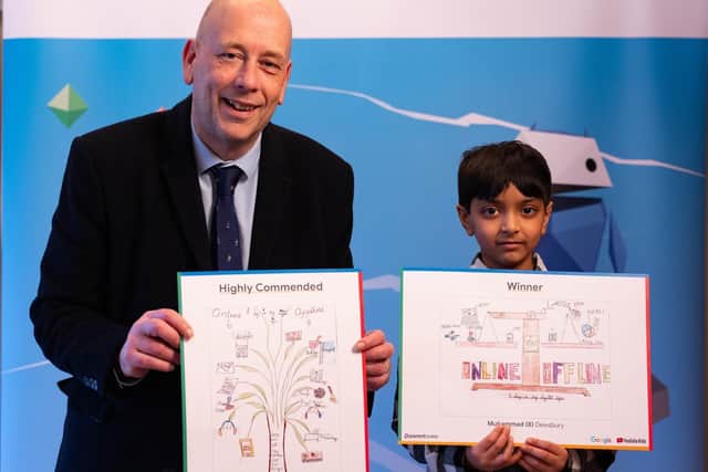 Dewsbury MP Mark Eastwood with Muhhamad Patel, eight, from Headfield Junior School in Dewsbury who was crowned one of the winners of a national art competition run by Parent Zone in partnership with Google