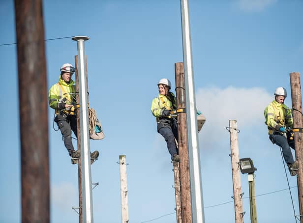 Trainees learning to pole climb at the Thornaby training centre