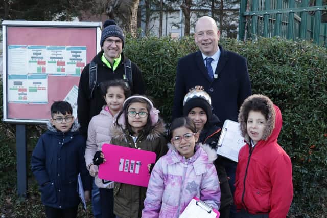 Dom Jacques (Living Streets), Mark Eastwood MP and pupils from Pentland Infant and Nursery School in Dewsbury
