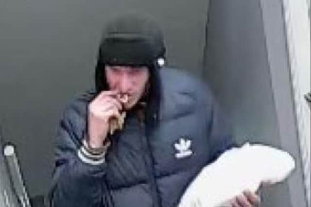 Police have issued this CCTV image of a man they want to speak with in connection with a series of robberies in Dewsbury